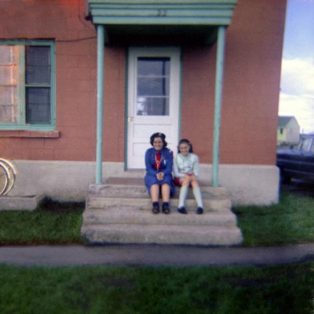 Edie and Carol Walker on the steps of 22 Kingston