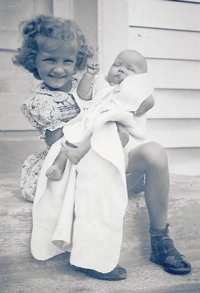 Zoe Fowler with baby sister Rosemary on the steps of 7 The Packway in 1954