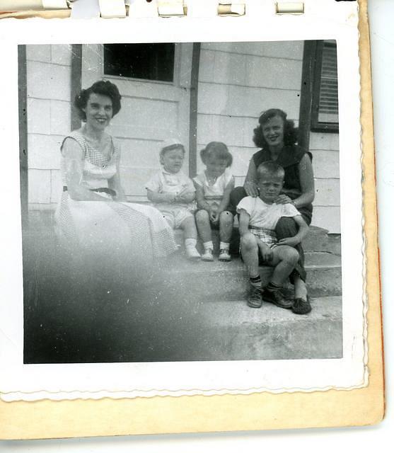 visiting with aunts & cousins on our front steps