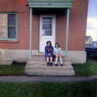 Edie and Carol Walker on the steps of 22 Kingston