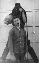 Bill Gillespie being hanged by a headless Doug Jordan