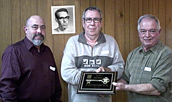 Bill Brown receives key to Addington Highlands